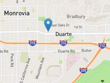 A map showing the area around Duarte, California, including highways I-210 and I-605, and nearby locations Monrovia and Bradbury, with a blue location pin.